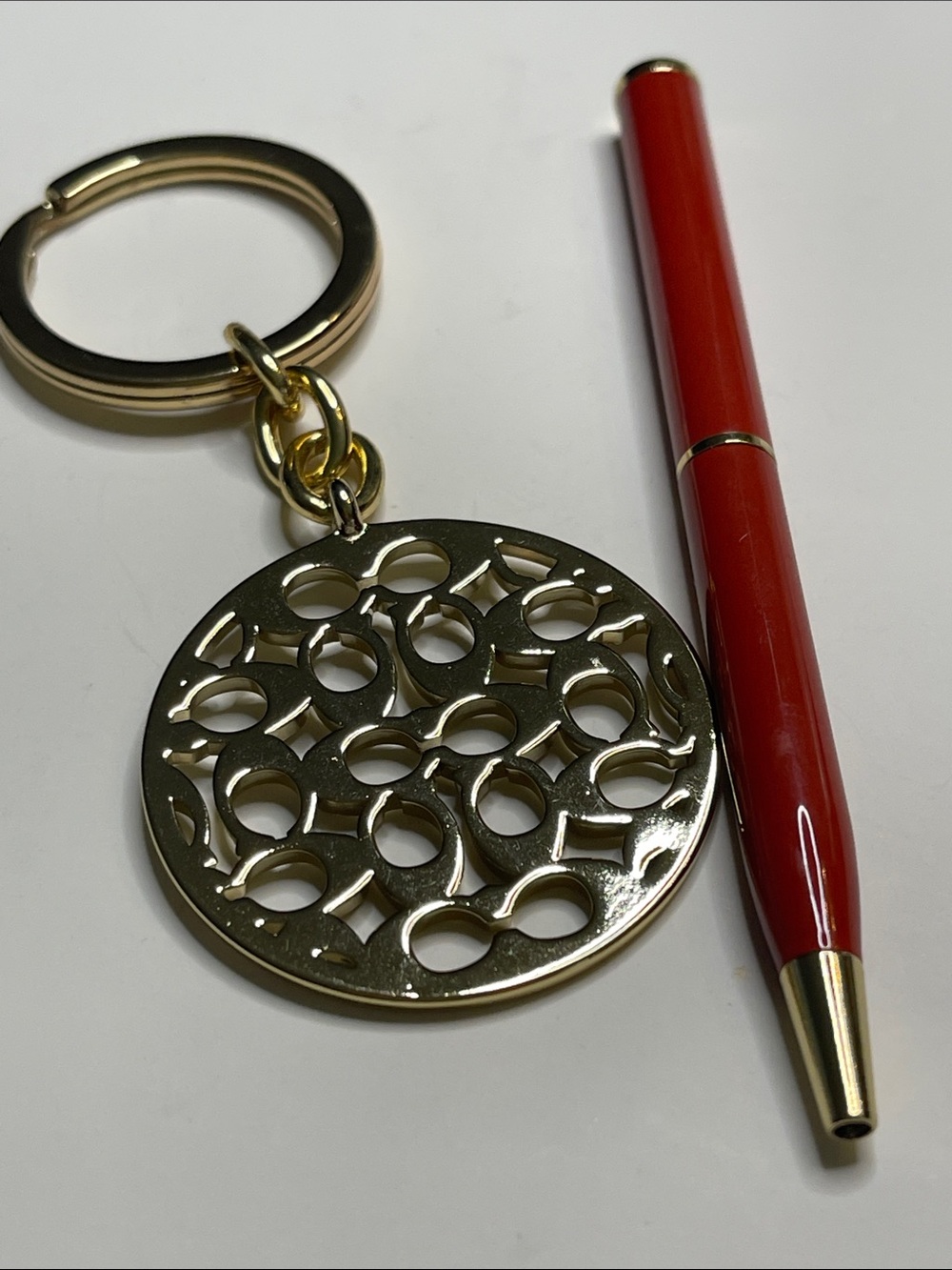 Coach Gold-tone Round Cutout C Coach Logo Keychain with Coach Pen